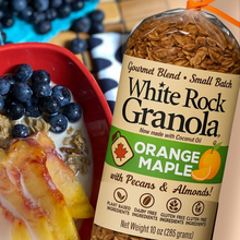 Load image into Gallery viewer, White Rock Granola with a bowl of granola, blueberries, and peaches on a wooden table.
